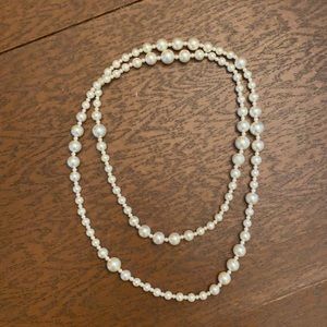 3/$15 or $7 Pearl necklace (costume jewelry).